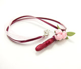 Burgundy pointe shoe pendant with cluster of pink roses